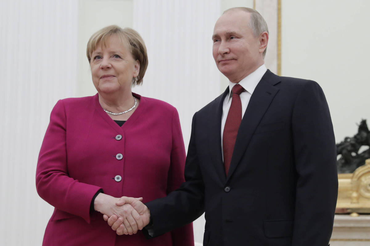20220704-bc-imago-Merkel und Putin
